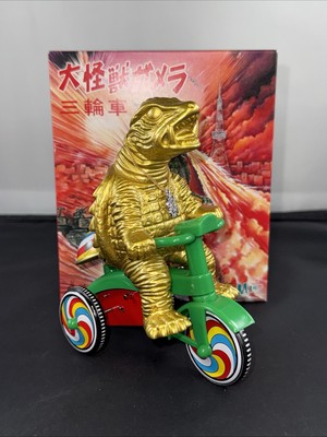 2024 M1 GAMERA 1967 GOLD TRICYCLE Super Fesitval Japan Godzilla NEW IN BOX-image